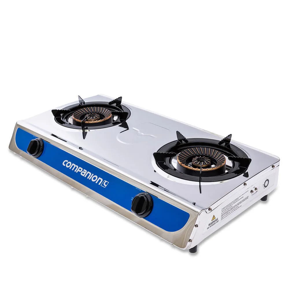 A stainless steel, two-burner portable gas stove with black burner grates and control knobs, labeled "Companion" on the front panel.