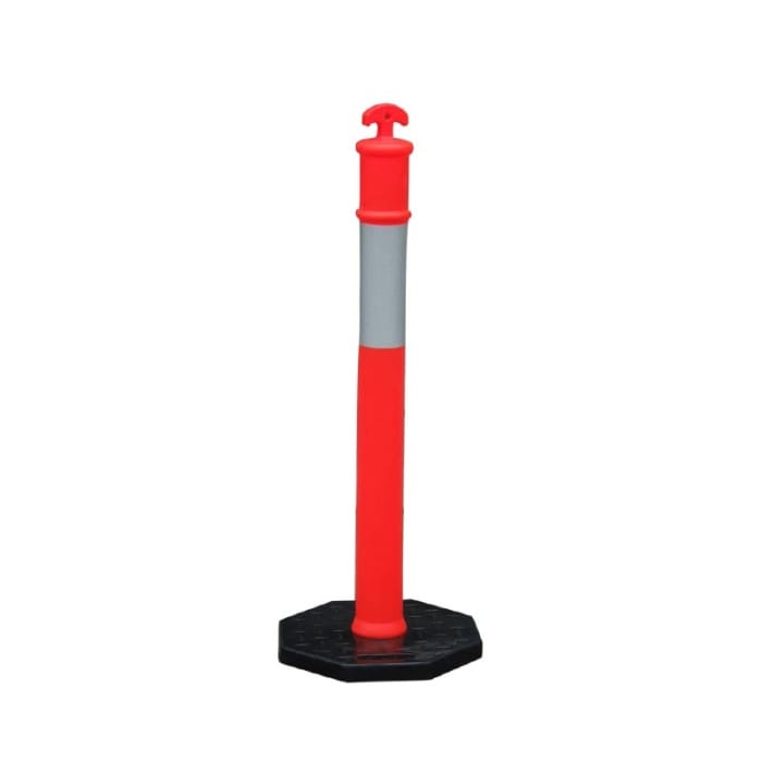 A red and gray traffic delineator post with a black hexagonal base, standing upright on a white background.