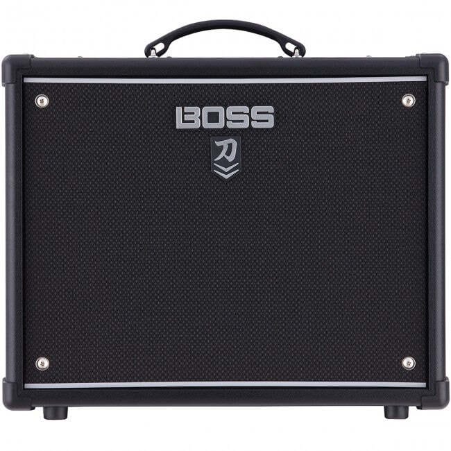 Front view of a black Boss guitar amplifier with a handle on top and the Boss logo centered above the speaker grille.