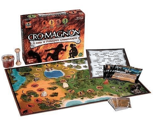 Cro-Magnon board game set displayed with game board, cards, instructions, timer, clay, and box featuring prehistoric artwork and tagline "A Game of Prehistoric Communication.