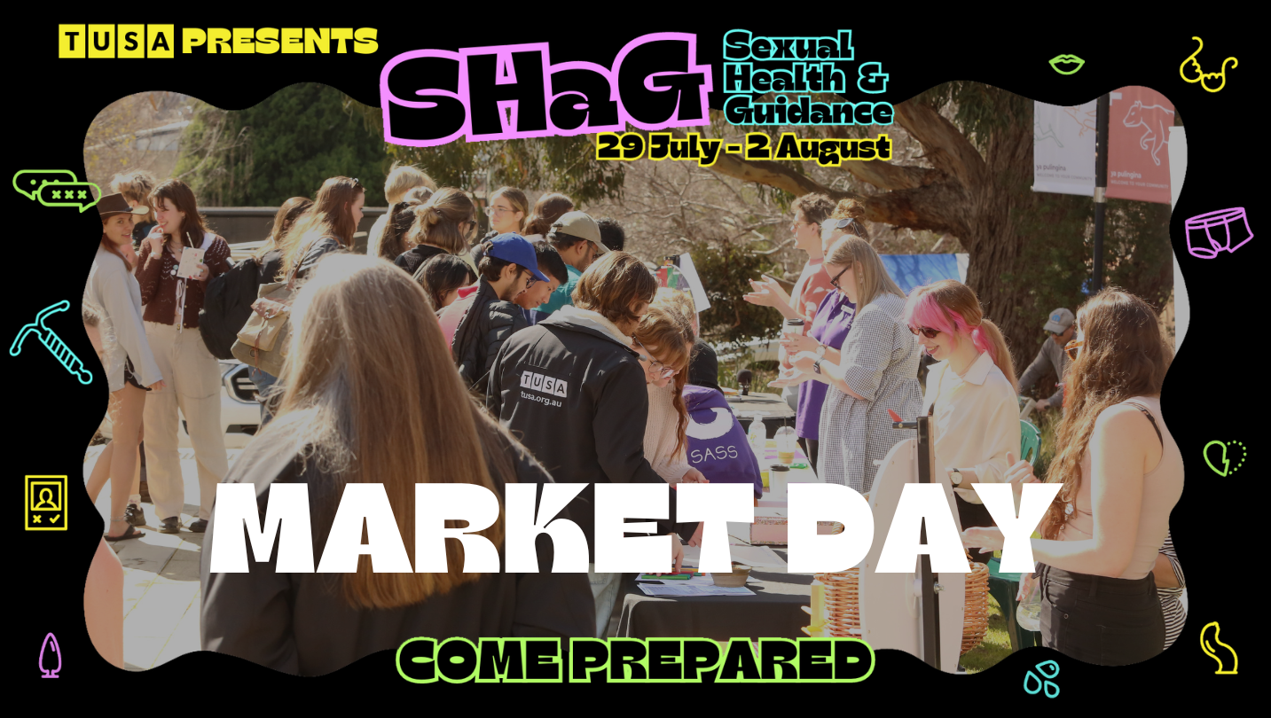 Students gathered at outdoor tables during Market Day event promoting Sexual Health and Guidance Week, with banners and informational materials visible.